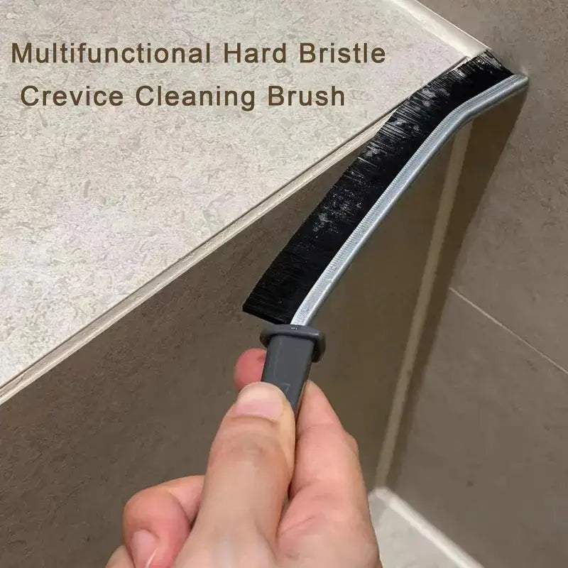 Hard bristled crevice cleaning brush for tight corners